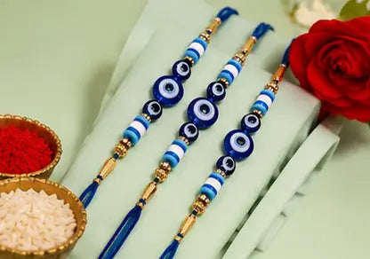 Rakhi Gift Combo Set for Brother – Set of 3 Evil Eye Rakhi with Ganpati Idol, Roli Chawal & Haldi | Raksha Bandhan Gift Pack