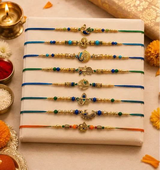 CraftVatika Rakhi Set of 8 for Brother – Religious Traditional Designer Rakhis with Greeting Card & Tilak Set