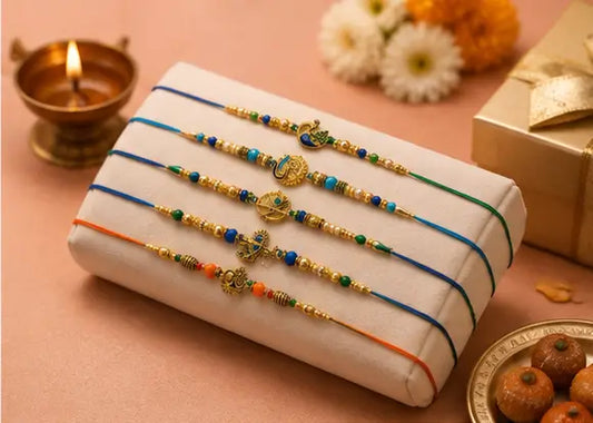 CraftVatika Rakhi Set of 8 for Brother – Religious Traditional Designer Rakhis with Greeting Card & Tilak Set